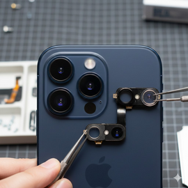 iPhone 14 Plus Rear Camera Replacement Showing Technician Fixing Back Camera Module With Precision Tools On Workbench.